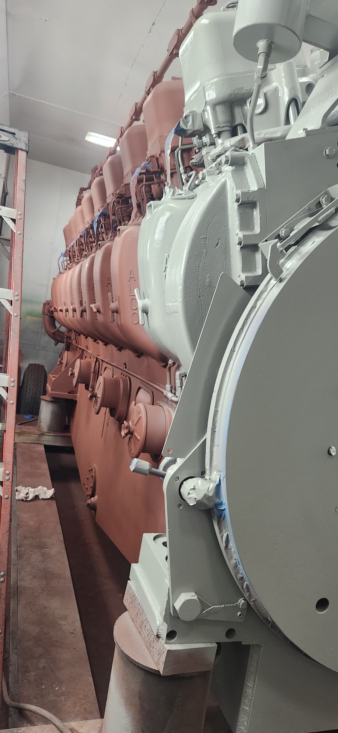 Primer coat and finish coat side by side along the engine bank